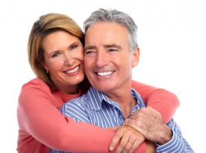 Happy laughing elderly couple isolated white background.